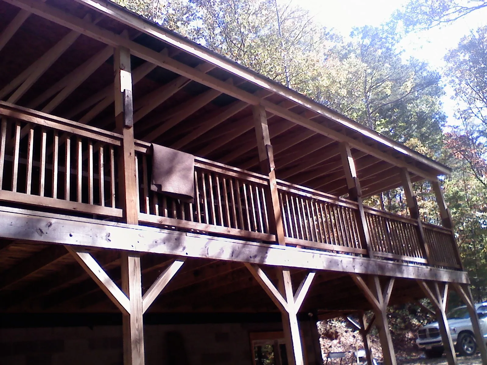 Timber framing under a new elevated porch and deck — Roof Leak Repair in Granite Springs by Roofing Brothers
